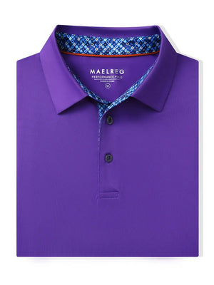 Folded Purple Everyday Classic Solid Polo neatly laid out for display