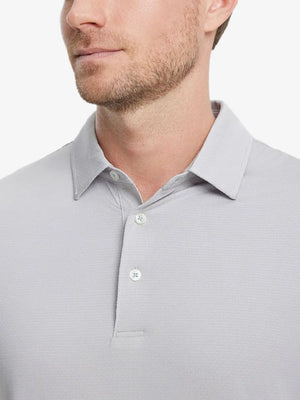 Close-up front shot from nose to chest of model wearing LIGHT GREY 4 Way Stretch Jacquard Polo