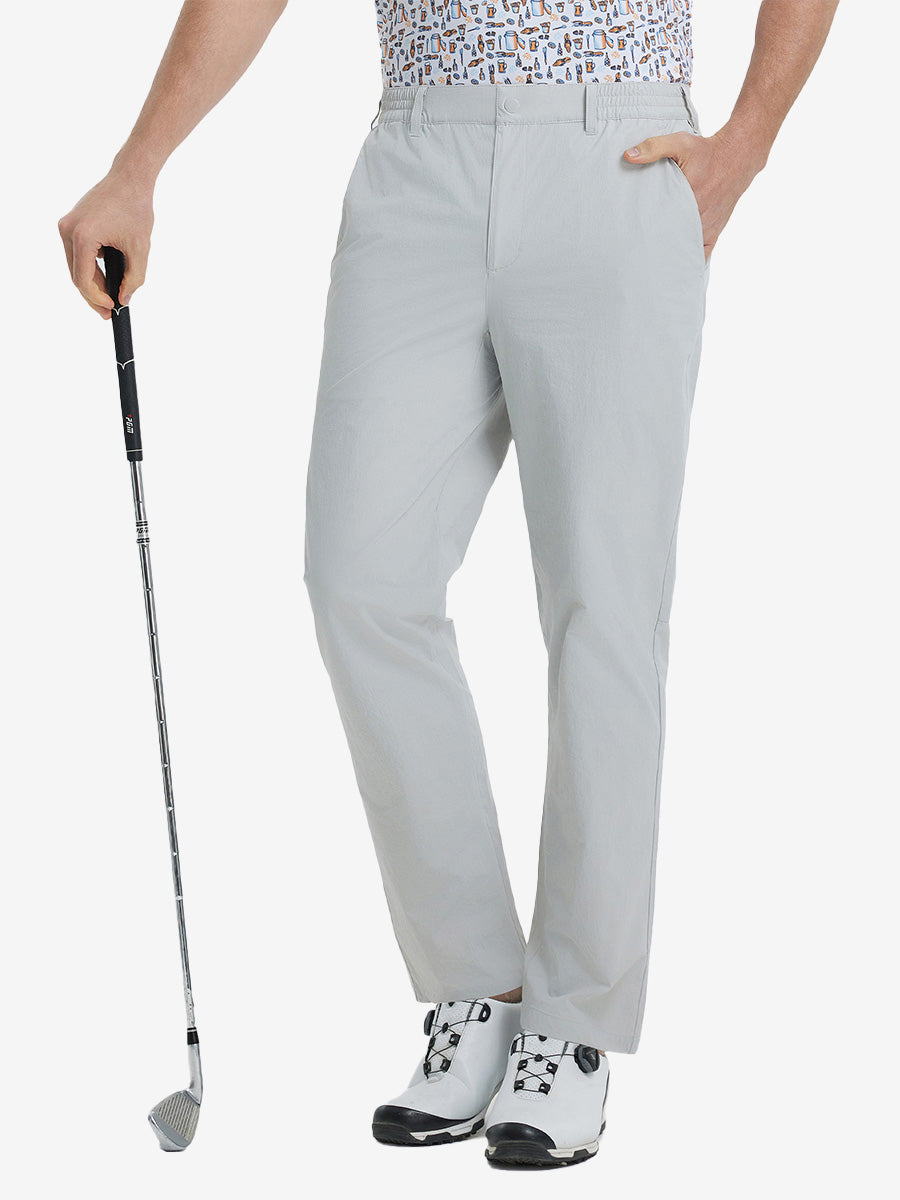 Front lower leg view of Performance Water Resistant Pants in SILVER GREY，model holds golf club in right hand.
