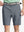 Front view of youth wearing navy Heather Performance Golf Shorts, showing fit and style