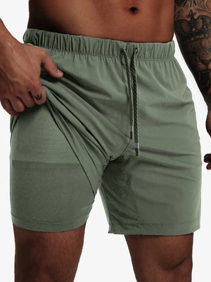 Front lower-body view from waist to knees showing stretch of OLIVE GREEN 2 in 1 Running Sports Shorts with Liner
