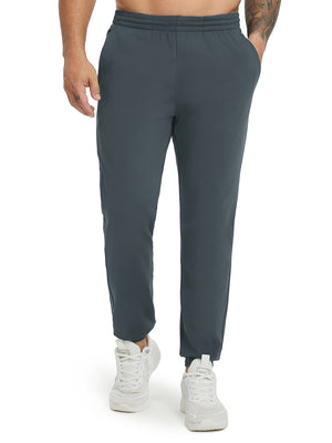 Model wearing Water Resistant Comfy Fleece Golf Joggers in dark grey, lower body front view
