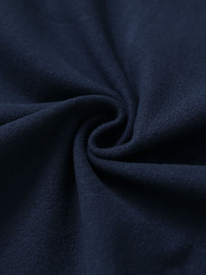 Fabric close-up of navy women's water-resistant stretch fleece lined jacket, soft stretch fabric with fleece lining.