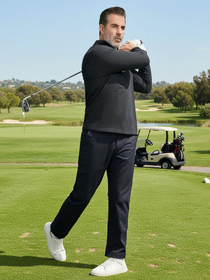 Texture heather fleece lined 1/4 zip pullover, golfer swinging in black on course, active pose