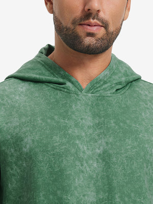 Close-up of neckline and drawstring area of the exclusive print kangaroo hoodies in green.