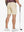 Back lower-body view of model in LIGHT KHAKI Water Resistant Versatile 8 Pockets Shorts.