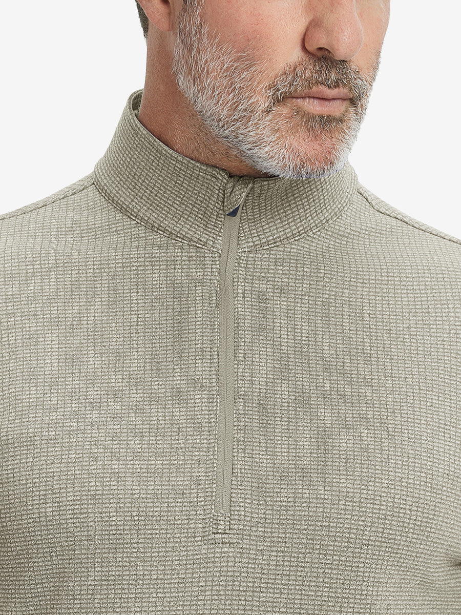 Close-up of collar and fleece lining on casual fleece lined quarter zip pullover in dust beige.