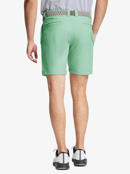 MINT GREEN 7 Inch Heather Performance Golf Shorts back view, model's lower body with hands in pockets
