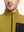 Close-up from nose to chest, showing collar detail of midweight warm stretchy quarter zip pullover in yellow.