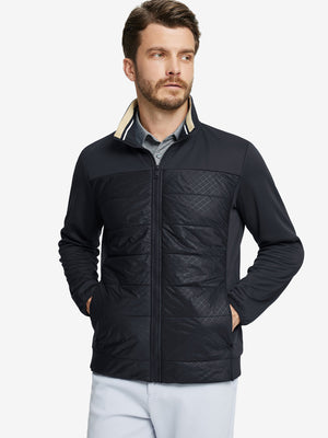 Front view of model with both hands in side pockets, wearing Golf Fleece Winter Jacket in black.