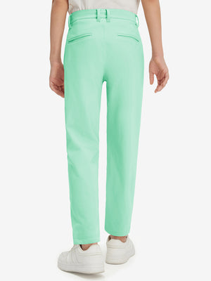 Boys Stretch Fleece Lined Casual Golf Pants in turquoise, back lower body view showing fit