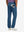 Back view of model wearing water-resistant golf stretch nylon pants, tailored stretch fit in blue indigo.