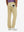Back view of model wearing water-resistant golf stretch nylon pants, tailored stretch fit in khaki.