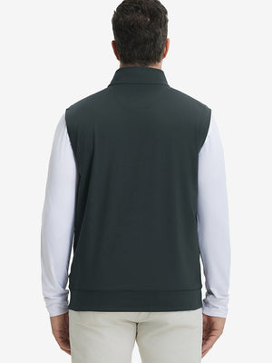 Back upper body view of the dark grey print collar quarter zip golf vest, clean cut and relaxed posture.