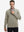 Model grabbing half-zip collar, wearing casual fleece lined quarter zip pullover in dust beige.