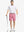 Full body front view of model wearing PINK 9 Inch Heather Performance Golf Shorts, holding a golf club