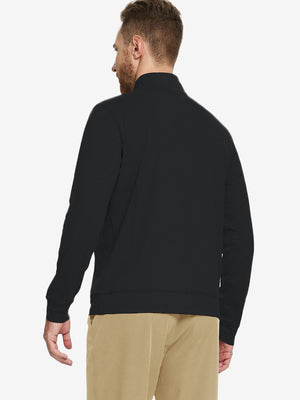 Back upper-body view of quarter zip melange pullover on model, shown in black.