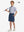 Full front: model in dark blue boys lightweight dry fit flat front golf shorts holding golf club.