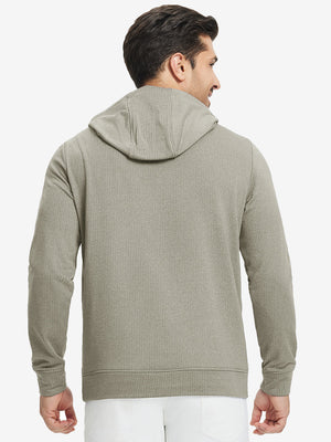Back upper view of model in warm fleece golf hoodies pullover  dust beige.