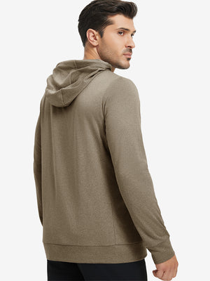 Back upper body view of the brown melange classic heather hoodie, model turns head slightly with ease.