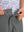 Detail: waistband of dark grey boys lightweight dry fit flat front golf shorts