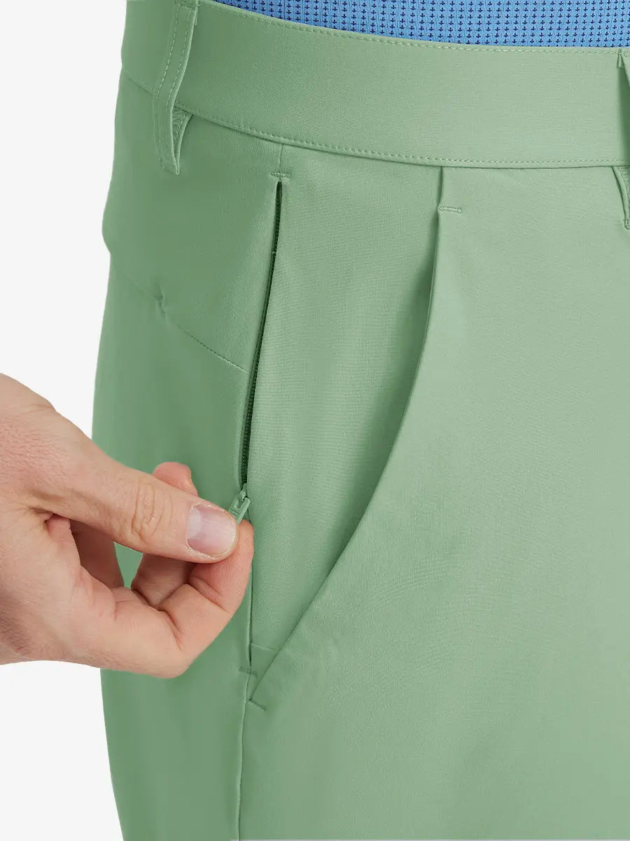 Close-up of right front pocket with zipper being opened on Player Fit Versatile Solid Shorts 7 Inch – BERYL GREEN