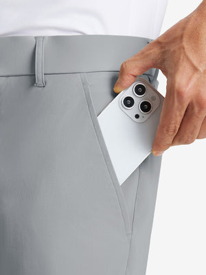 iPhone placed inside pocket of the Light Grey Quick Dry Casual Shorts, showing storage space.
