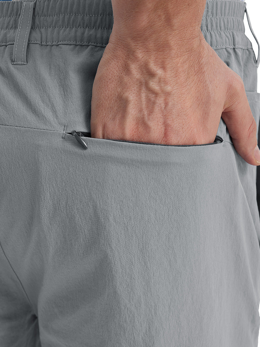 Back view of Performance Water Resistant Pants in NEUTRAL GREY，model’s hand casually in back pocket.
