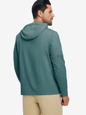 Back upper view of model wearing casual solid fleece hoodies pullover in ocean green, showing smooth seams.