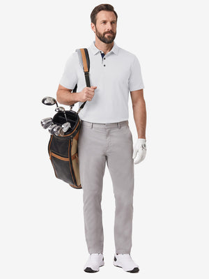 Front full body shot of model exercising in white ultra-comfort slim fit roma knit polo shirts