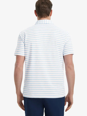 Back view of model in Pink Blue Stripe Performance Stripe Golf Shirt