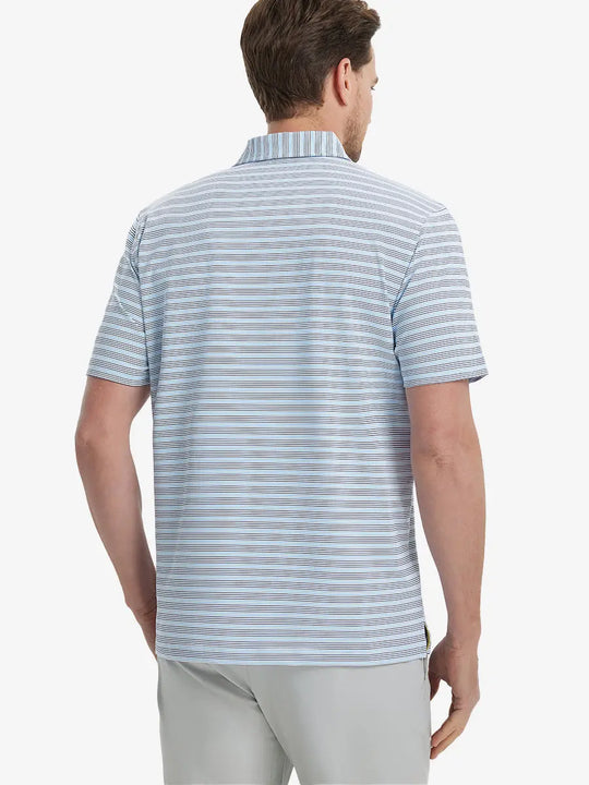 Back view of model in Navy Blue Stripe Performance Stripe Golf Shirt