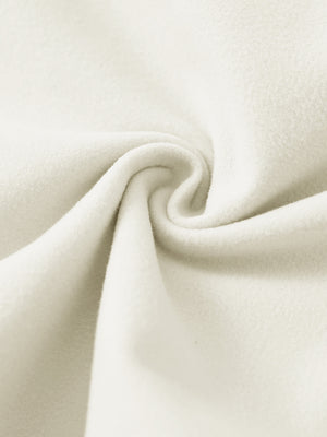 Close-up of the fabric of women's stretch fleece lined water resistant joggers in beige, highlighting the fleece lining.