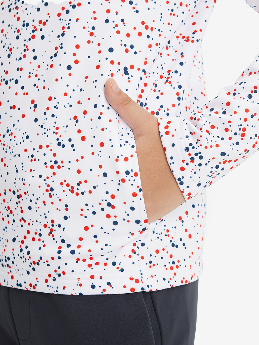 Model with both hands in pockets wearing youth full print stylish hoodies pullover in white polka dots.