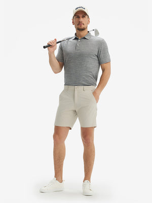 Full-body shot of model holding a golf club in light grey flower breathable jacquard pattern 3-button golf polo