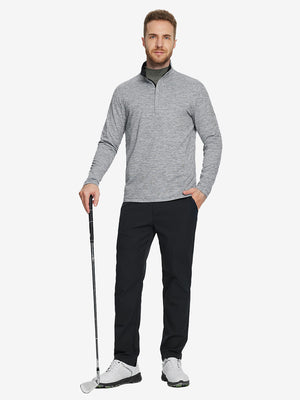 Man wearing Heather Pinstripe Brushed Dry Fit Quarter Zip Pullover in black heather, holding golf club on course