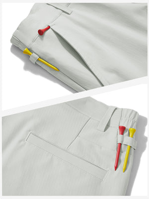 Waistband detail of lightweight flat front casual trousers in silver grey, showing clean stitching.