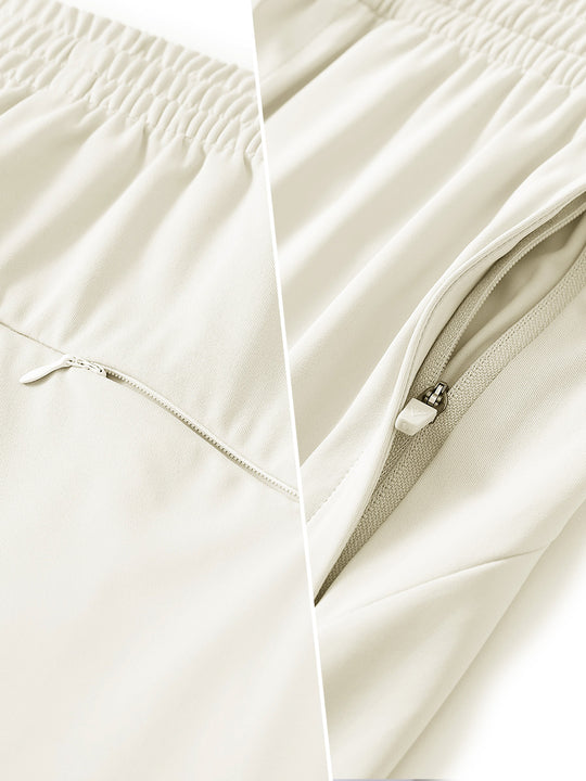 Two-part detail of lightweight women's stretchy joggers sweatpants zippers shown in cream.