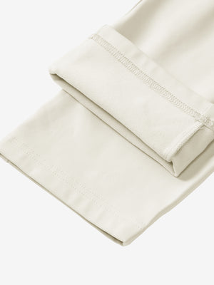 Boys Stretch Fleece Lined Casual Golf Pants in beige, flat lay showing fleece lining