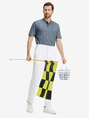 Full front: model in grayish blue flower stretch printed collarless henley golf shirts holding golf ball.