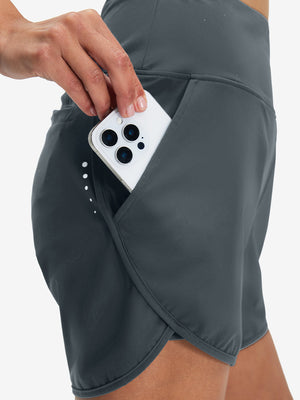 Pantalones cortos de secado rápido 2 en 1 de talle alto para mujer con 7 bolsillos