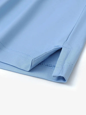 Close-up detail of hem slit on Everyday Solid Jersey Polo in LIGHT BLUE, featuring fine stitching.