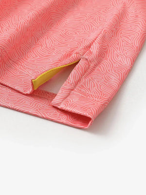 Close-up of side slit on CANDY PINK LINE polo, crafted for breathability and movement
