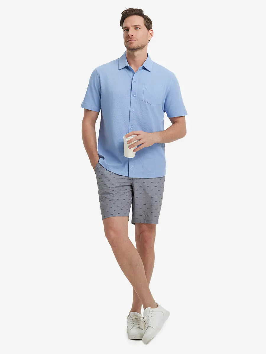 Full-body view of model holding takeaway drink cup in LIGHT BLUE Cotton Blend Plain Shirt.