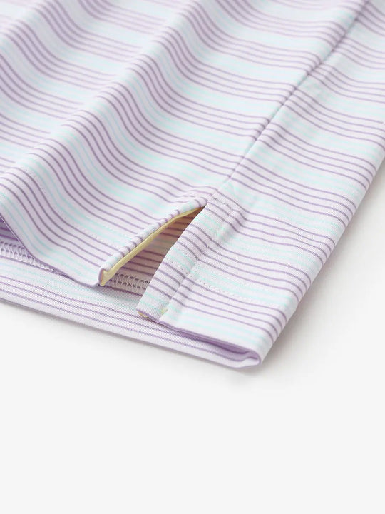 Close-up of side hem slit on Lilac Light Blue Stripe Performance Stripe Golf Shirt