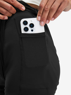 Pantalones cortos de secado rápido 2 en 1 de talle alto para mujer con 7 bolsillos