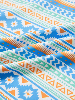 Close-up of blue ethnic full print lightweight quarter zip pullover fabric, soft and breathable texture