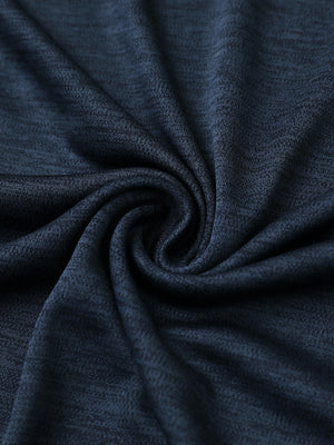 Close-up of navy heather modern fit melange polo fabric showing soft and textured surface.