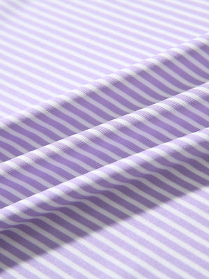 Texture close-up of Kids stripe golf polos with soft fabric and bright lavender white stripe stripes