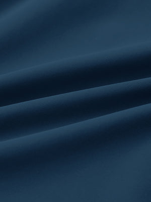 Fabric detail of Performance tapered sports joggers with smooth stretch feel in blue indigo